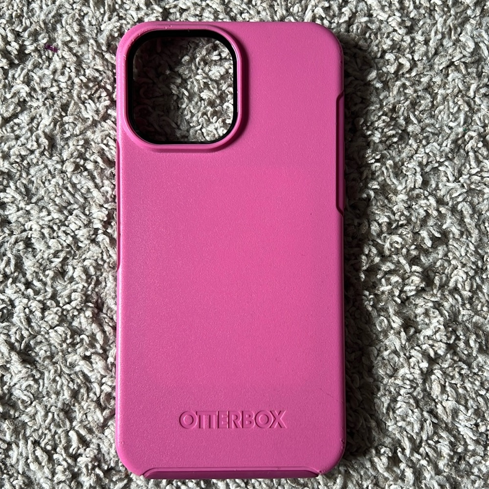 Hot Pink Otterbox Symmetry Case for iPhone 13 Pro Max.
